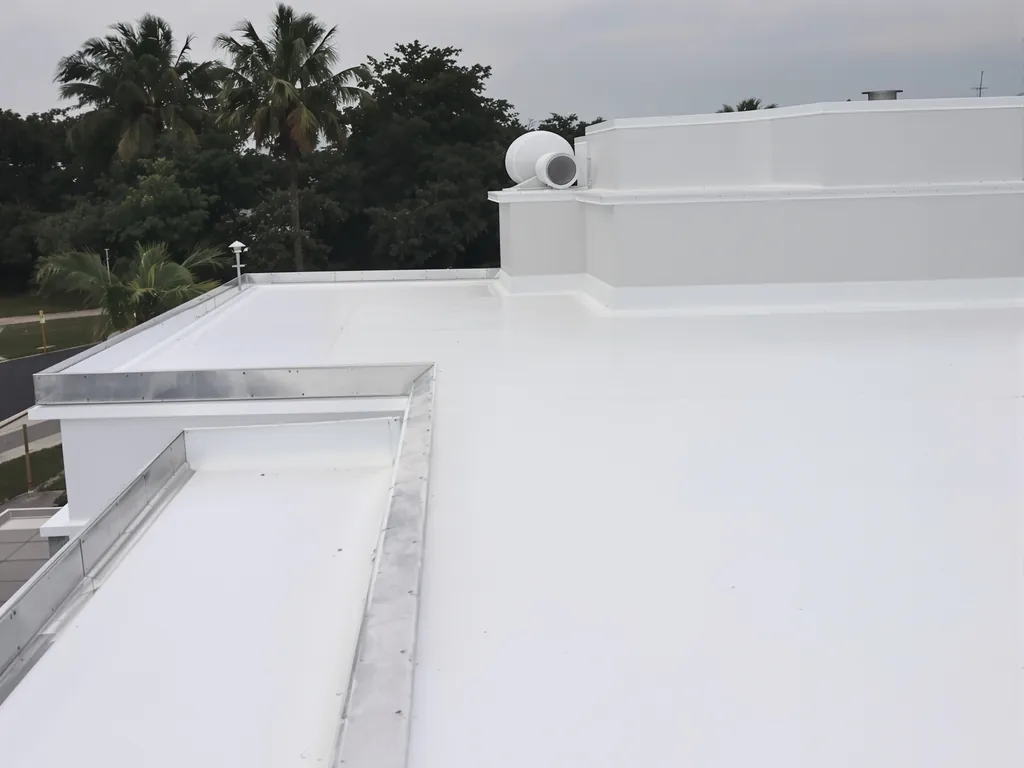 New white TPO membrane flat roof on a Siesta Key building